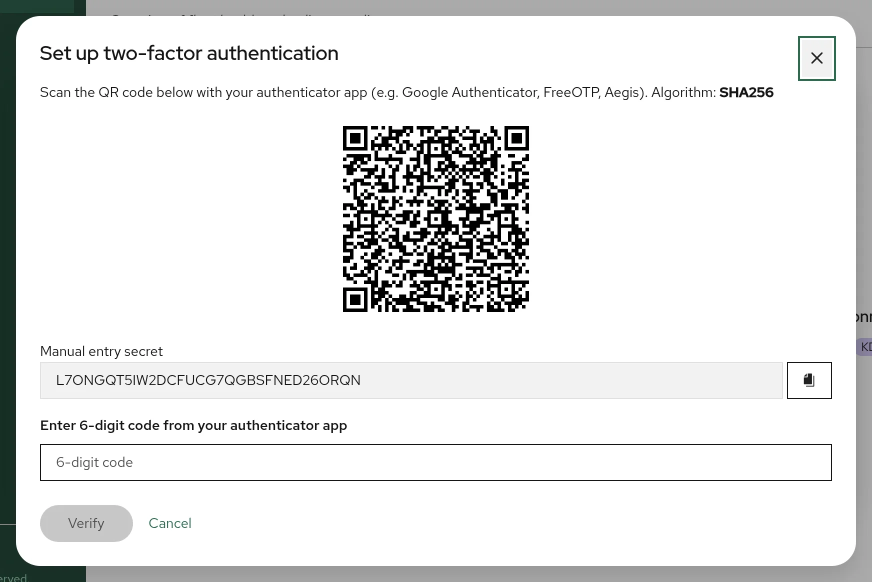 Set up two-factor authentication dialog with a QR code, the manual entry secret and the field for the 6-digit code